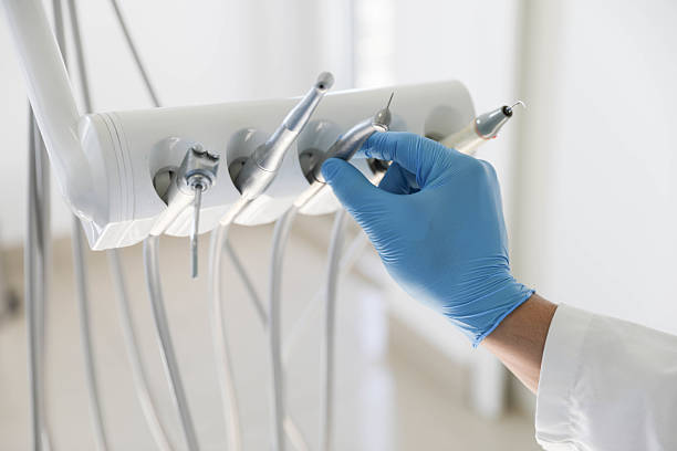 Professional Tooth Extraction technician working in Sausalito, CA